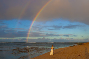 rainbow after rain at beach wedding